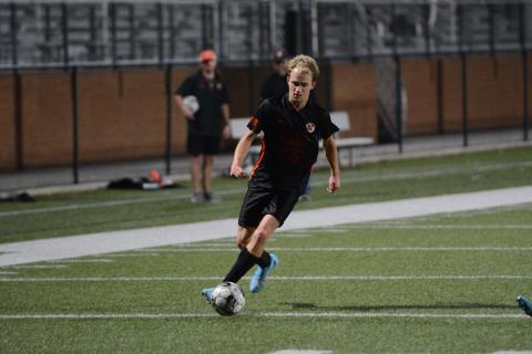 Will Bell scores the lone goal in the 3-1 loss to the Blue Devils of Elbert County on April 15. (Photo/Benjamin London)