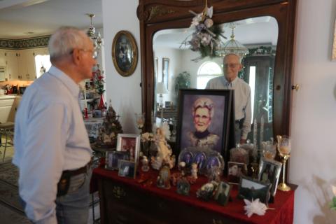 Evans reflects on his life with Evelyn in their home. When he’s not counting cars, Evans enjoys maintaining his yard – including cutting grass – and his home he shared with his wife of 72 years, Evelyn. (Photo/Rose Scoggins)