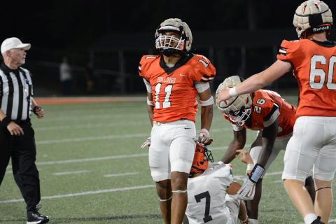 Rising senior linebacker Elijah Garnett celebrates after sacking the quarterback in the 24-7 win over Habersham May 16. (Photo/Benjamin London)