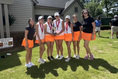 Pictured is the girls golf team with the state runner-up trophy after placing second as a team at state. (Photo submitted by HCHS Golf)