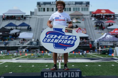 Junior pole vaulter Luke Samples captures back-to-back state titles after clearing 16’6” at the state meet on May 9. (Photo/Benjamin London)
