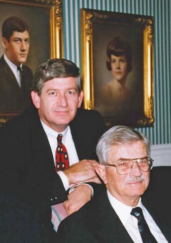 This photo—taken in December 1997—was my dad’s last Christmas with us. Until our mother died in 2014, the Leon Loard portraits, in the background, of sisters Sandy and Sheila (pictured) and me always hung side by side. Today the portraits are in each of our homes. (Photo submitted by NeSmith)