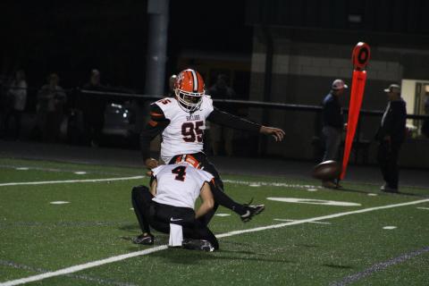 Rising senior kicker German Franco (95) nails a field goal that was held by former Bulldog’s wide receiver Pearce Mewborn in a 40-10 win over the Eagles of East Jackson. (Cheyenne Tolleson/Jackson Harold TODAY)