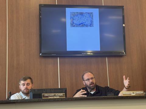 Mayor Brandon Johnson (right) sitting with council member Zachary Adams (left), speaking out to the public about a new rezoning ordinance proposed at Monday's city council meeting. The ordinances are available to the public on the city council website and are not finalized. (Photo/Adriana Cascio)