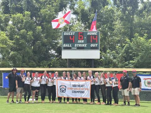 The Hart County Senior League Softball team poses in front of the scoreboard showcasing their dominating 14-4 win over Florida in the Southeast Regional Championship Monday in Clarkesville, Tennessee. As the Southeast Regional Champions, the team will represent Hart County in the Senior League Softball World Series for the first time in Hart County history July 28 through Aug. 3 in Lower Sussex, Delaware. (Photo courtesy of Hart County Little League)