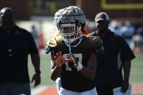 Kurston Curry awaiting the snap during a football practice (Photo/Benjamin London)