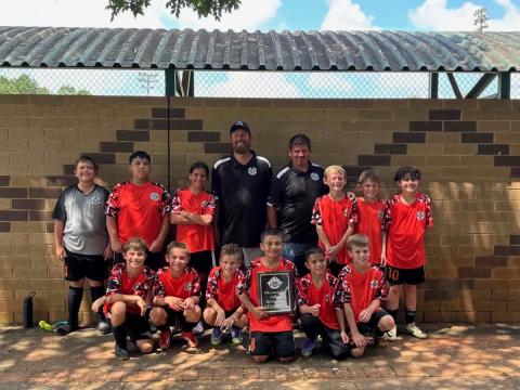 Pictured is the 12U Hart Academy soccer team after capturing the programs first ever tournament win Aug. 16 in Athens. (Photo submitted by Hart Academy)