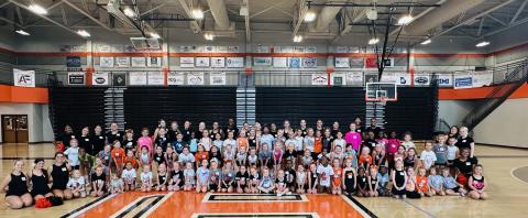 Pictured is nearly 80 campers alongside the current Hart County High School cheer squad at this years Little Bulldogs Cheer Camp Aug. 16. (Photo submitted by Hart County High School Cheer)