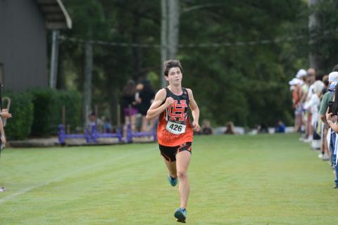 Junior runner Sevyn Singleton placed eighth overall to help the team finish third at Athens Christian Aug. 16. (Photo by Benjamin London)