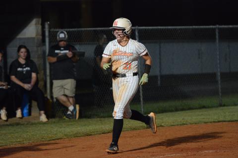 Junior pitcher Chesnee Strickland rounds the bases after a solo home run in the bottom of the second inning as the Lady Dogs pick up their second region win of the season with a 16-1 win over East Jackson Sept. 16. (Photo by Benjamin London)