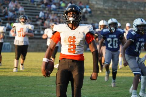 EJ Watkins celebrating after a touchdown run. (Photo by Ric Williams)