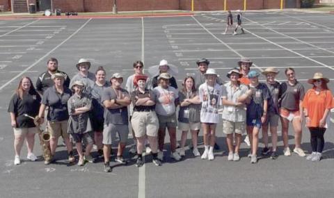 a group of Bulldog Marching Band students dressed like director Alan Tolbert on the last day of band camp in July to honor the long-term band director who is slated to retire in June after 27 years of directing the marching band. (Photo courtesy of the Hart County Bulldog Marching Band)