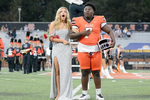 Erin Miller and senior football player Ormani Rucker react as Miller was announced as the 2025 Miss Bulldog prior to the game. (Photo by Benjamin London)