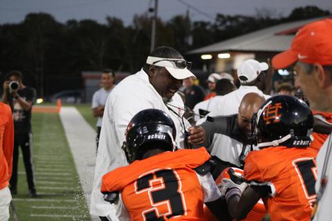 HCMS head football coach Earl Fouch soaks it in after a Gatorade bath in the 27-12 win over Madison County to capture the NEGIAA Championship Oct. 16. (Photo by Benjamin London)