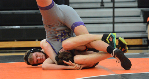Senior Ethan Stovall pins his opponent in the 40-35 win over Union County Nov. 20 in the Dog Pound. 