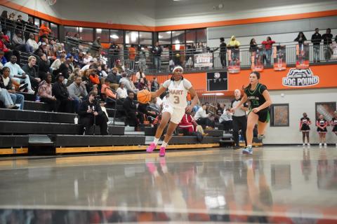 Senior forward Kiasia Montgomery (left) races up the floor on a fast break in the 46-32 win over the Lady Lions of Franklin County Jan. 20. Photo by Ric Williams.