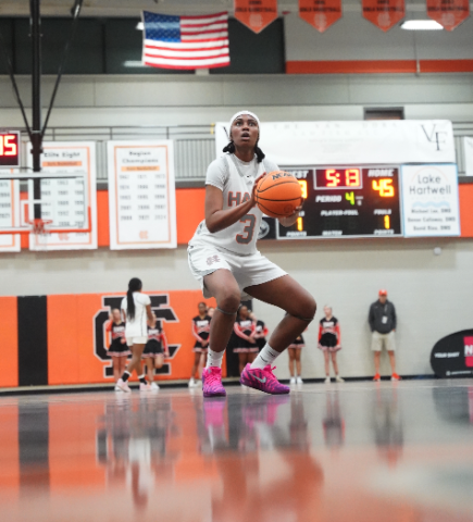 Senior forward Kiasia Montgomery makes crucial free throws late in the game to help seal a double-overtime win against the Lady Wildcats of Woodmont, 59-53, in the North Georgia Report Lake Hartwell Border Battle Jan. 10. Photo by Ric Williams.