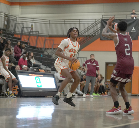 Senior forward Ramarcus Simpson pulls up for a three in the 67-56 loss to the Rams of Westside Jan. 10 in the North Georgia Report Lake Hartwell Border Battle. Photo by Ric Williams.