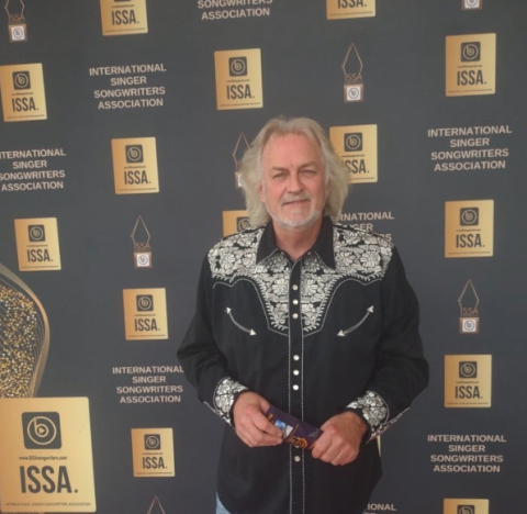 Steve Coughlin poses at the 2025 International Singer Songwriters Association awards. The group received several nominations, including Band of the Year and Band Single of the Year. Courtesy photo from Steve Coughlin. 