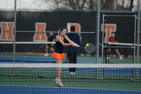 Gabriella Bernasky returns a serve in the 4-0 win over the Lady Devils of Elbert. Photo by Benjamin London. 