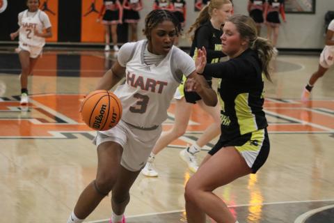 Photo by Grayson Williams Senior forward Kiasia Montgomery drives inside the paint, as she scored 23 points in the 60-39 win over the Lady Mountaineers of North Murray in the first round of the state playoffs Feb. 24. Photo by Grayson Williams.