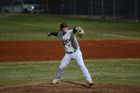 Junior pitcher Riley Sanders pitched three scorless innings in relief while striking out six and allowing one hit in the 7-6 win over Banks County Feb. 9. Photo by Benjamin London. 