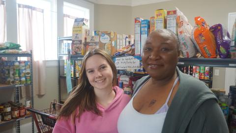 Assistant director Beth Mason and director Keisha Henry stock shelves at the Hart County Food Pantry on Mondays. The pantry offers perishable and non-perishable goods. Photo by Madison Linton.