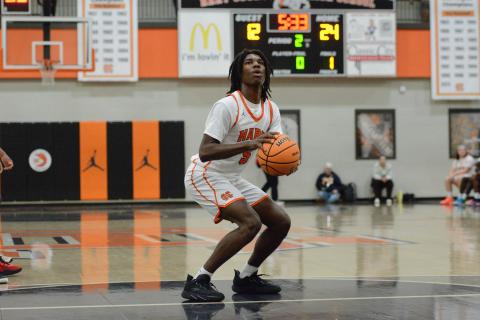Boys basketball’s senior forward Ramarcus Simpson earns Athlete of the Week. Photo by Benjamin London.