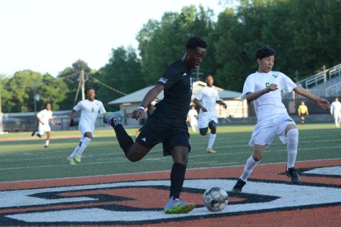 Cayson Craft scores his fourth goal out of the five goals he scored in the 10-1 win over the Eagles of Josey April 16.  Photo by Benjamin London.