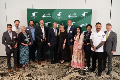 Group photo of the 2026 Small Business ROCK STARS, including Fabritex, Inc. President Lee Adams (eighth from left) and Marketing and Sales Director Jenny Scott (ninth from left) with Gov. Brian P. Kemp (sixth from left), First Lady Marty Kemp (seventh from left) and Georgia Department of Economic Development Commissioner Pat Wilson (far right). Photo by Ben Gray Photography, courtesy of the Georgia Department of Economic Development.