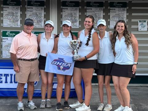 The Lady Dogs pose with the State Championship trophy after capturing the state title in Blackshear at the Okefenokee Country Club May 18-19.  Photo submitted by Hart County Golf. 