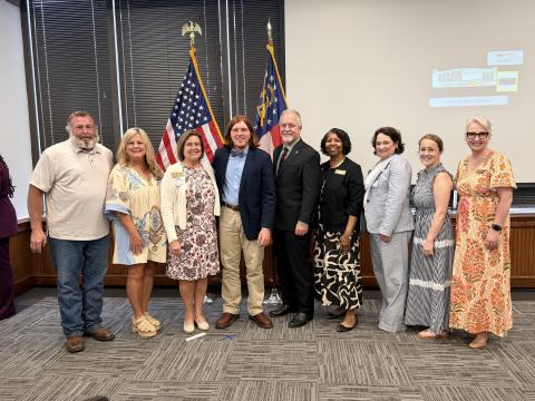 Senior Lockaby "Lock" Powell was honored by the Georgia Department of Education (DOE) with the prestigious "Award of Excellence" in April. He is pictured above and below with his family, members of the DOE and State School Superintendent Richard Woods. Photo by Grayson Williams.