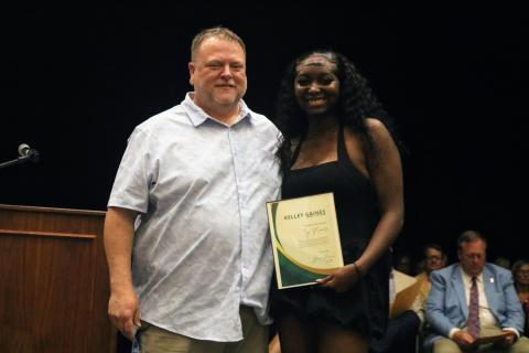Left, Zy'tajia Moore (right) was awarded the Kelley Gaines TSA Memorial Scholarship by Greg Gaines during the senior awards night at Hart County High School April 29. Photo courtesy of Hart County Charter System.