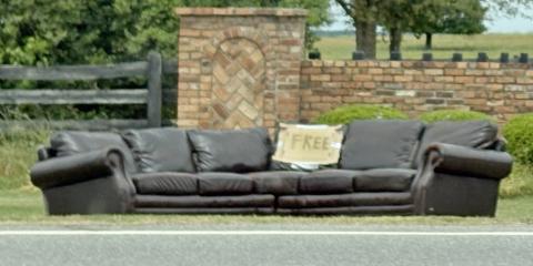 With a “FREE” sign attached to this brown leather couch, it didn’t take long for the next owner to snare the sofa from the country roadside. Photo submitted by Dink NeSmith.