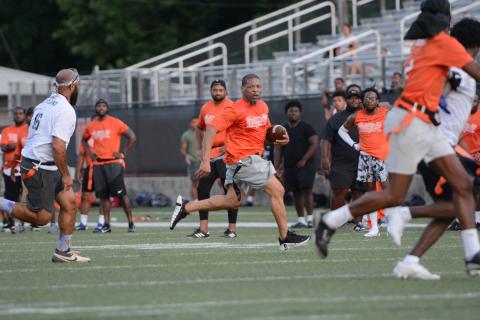 75 former players returned back to Herndon Stadium to compete in the second annual Harper Island Training Alumni Flag Football Game June 19. Photo by Benjamin London.
