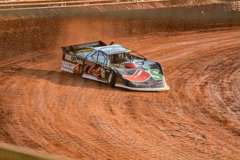 NASCAR Cup Series driver Carson Hocevar drives his No. 77 Ride the ‘Dente Chilli’s Chevrolet into the turn at Lavonia Speedway July 10. Photo by Benjamin London.