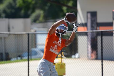 Senior wide receiver PJ Johnson makes the catch during a practice on July 16. Photo by Benjamin London.