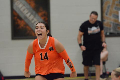 Setter Josee Fleming celebrates after Hart completed the comeback to knock off Madison County in three sets, 18-25, 25-16 and 15-10 Aug. 11. Photo by Benjamin London. 