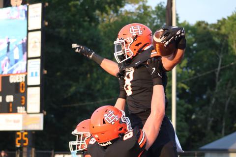 Senior running back Kaidyn Allen celebrates after scoring the opening touchdown in the 51-3 win over the Raiders of Habersham Central Aug. 21. Photo by Grayson Williams. 