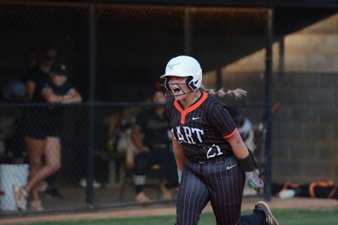 Senior pitcher and infielder Chesnee Strickland celebrates rounding third after blasting a two-run home run in the 4-3 win over Hebron Christian to hand the top ranked Lady Lions their lone Region 8-AAA loss of the season Sept. 15. Photo by Benjamin London.