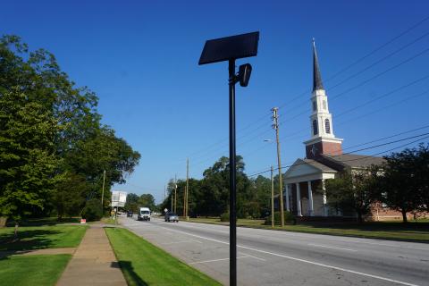 A flock camera in the City of Hartwell. State lawmakers are working to curb misuse of the cameras after several arrests statewide.  Photo by Madison Linton. 