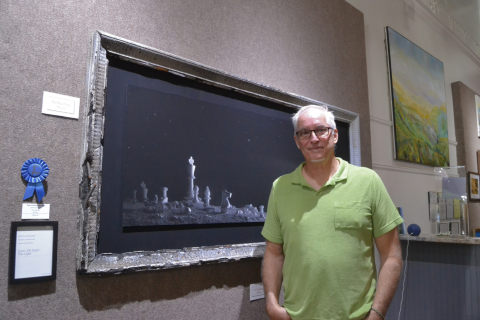Hartwell photographer and Barking Dog Studios owner John Cumming won first place in the 2026 Annual Regional Juried Art Show for “Soon, Oh Soon the Light”, a carefully constructed photograph inspired by “The Gates of Delirium,” a 22-minute battle depiction in song form by the English rock band Yes.  Photo by Madison Linton.