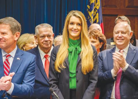 Soon-to-be U.S. Sen. Kelly Loeffler is introduced by Gov. Brian Kemp at a press conference Wednesday announcing her appointment to Congress for one year. Photo courtesy of Gov. Brian Kemp's office.