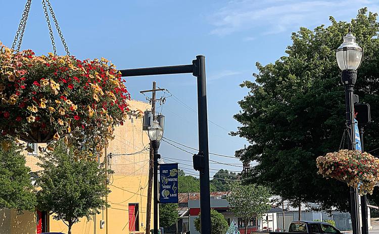 Flower baskets, shown here, were recently taken down in downtown Hartwell.