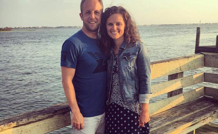 Scott and Megan Lykins pose for a photo. Megan is the new sports director for the Bell Family YMCA.