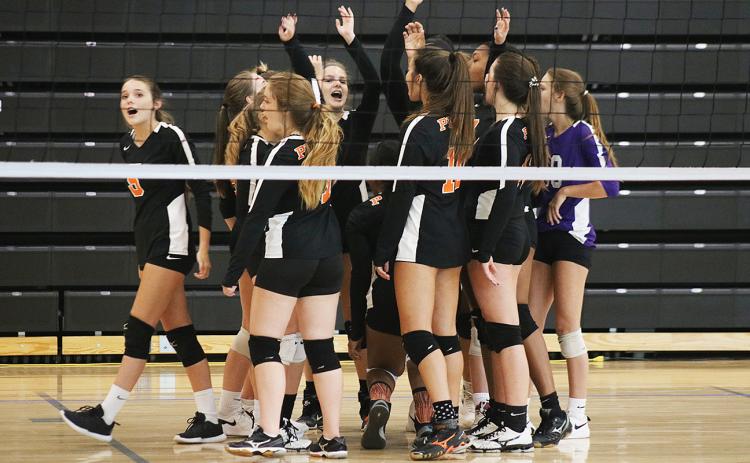 Sunshots by Grayson Williams — The Hart County Volleydogs celebrate a point during a match last week at Hart County High School.