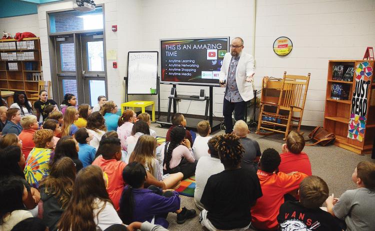 Sunshot by Michael Hall -- A group of fifth-grade students at South Hart Elementary listen on Aug. 29 to Brian Buffington, director of instructional technology for Pioneer RESA, teach about how to stay safe and be positive on social media and online.