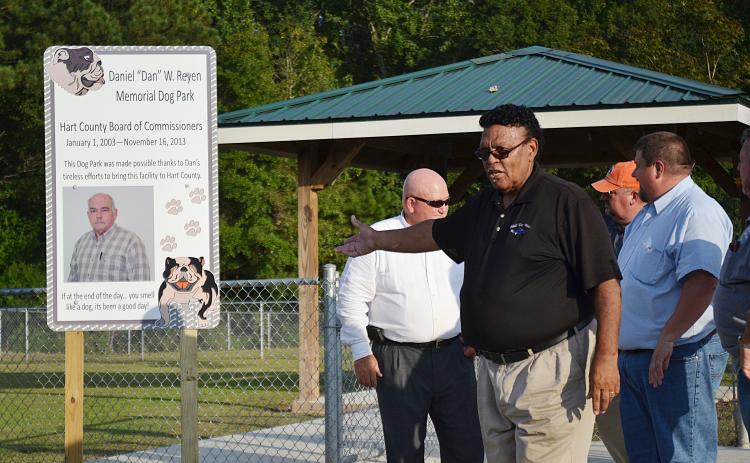 Sunshot by Michael Hall — Hart County Commissioner R.C. Oglesby talks during the dedication ceremony on Sept. 5 naming the dog park at the Hart County recreation complex after the late commissioner Dan Reyen.