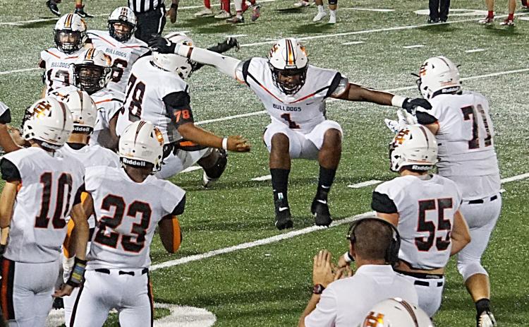 Photos submitted — Hart County’s Kaimon Rucker, No. 1, leaps as he celebrates a play on Sept. 14 in Madison County with Will Hardmon, No. 78, Caden Hart, No. 71, Seth Elrod, No. 55 and Malachi Kelley, No. 23.