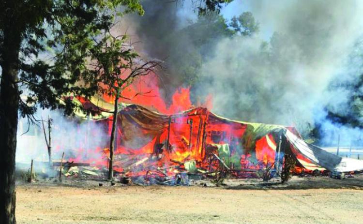 Photo submitted The Lake House Tavern burns Saturday morning on Rock Springs Road.
